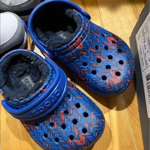 Blue and red furry crocs